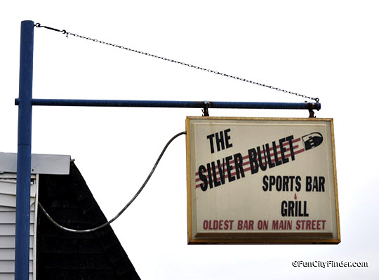 Signage for the Silver Bullet Sports Bar and Grill, a restaurant and bar in Beech Grove, Indiana