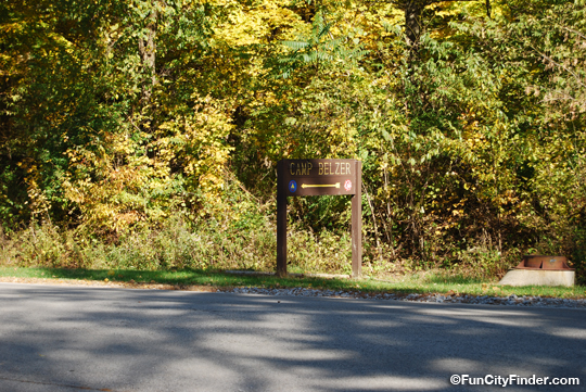 Photo of the Boy Scouts of America Camp Chank-Tun-Un-Gi wooden sign at the entry in Lawrence, Indiana.