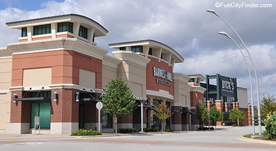 A Barnes & Noble bookstore next to a Dick's Sporting Goods at the Metropolis Shopping Center in Plainfield, Indiana